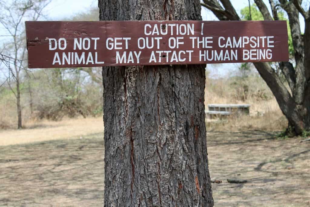 Sign warning against wild animals at our Serengeti Camp Site on African Safari