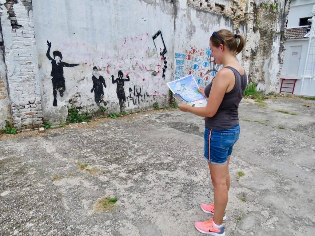Joannda deciphering street art trail in Ipoh Malaysia