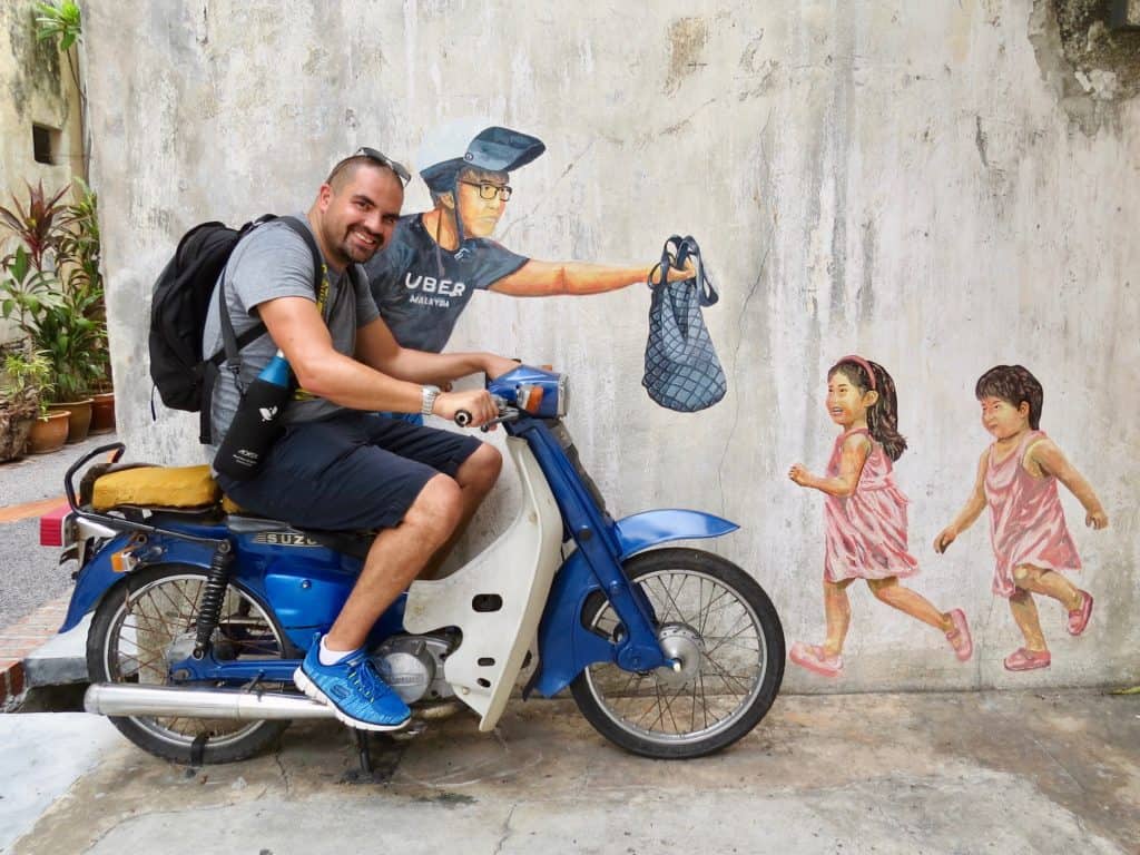 Omer on a scooter - Uber delivery mural
