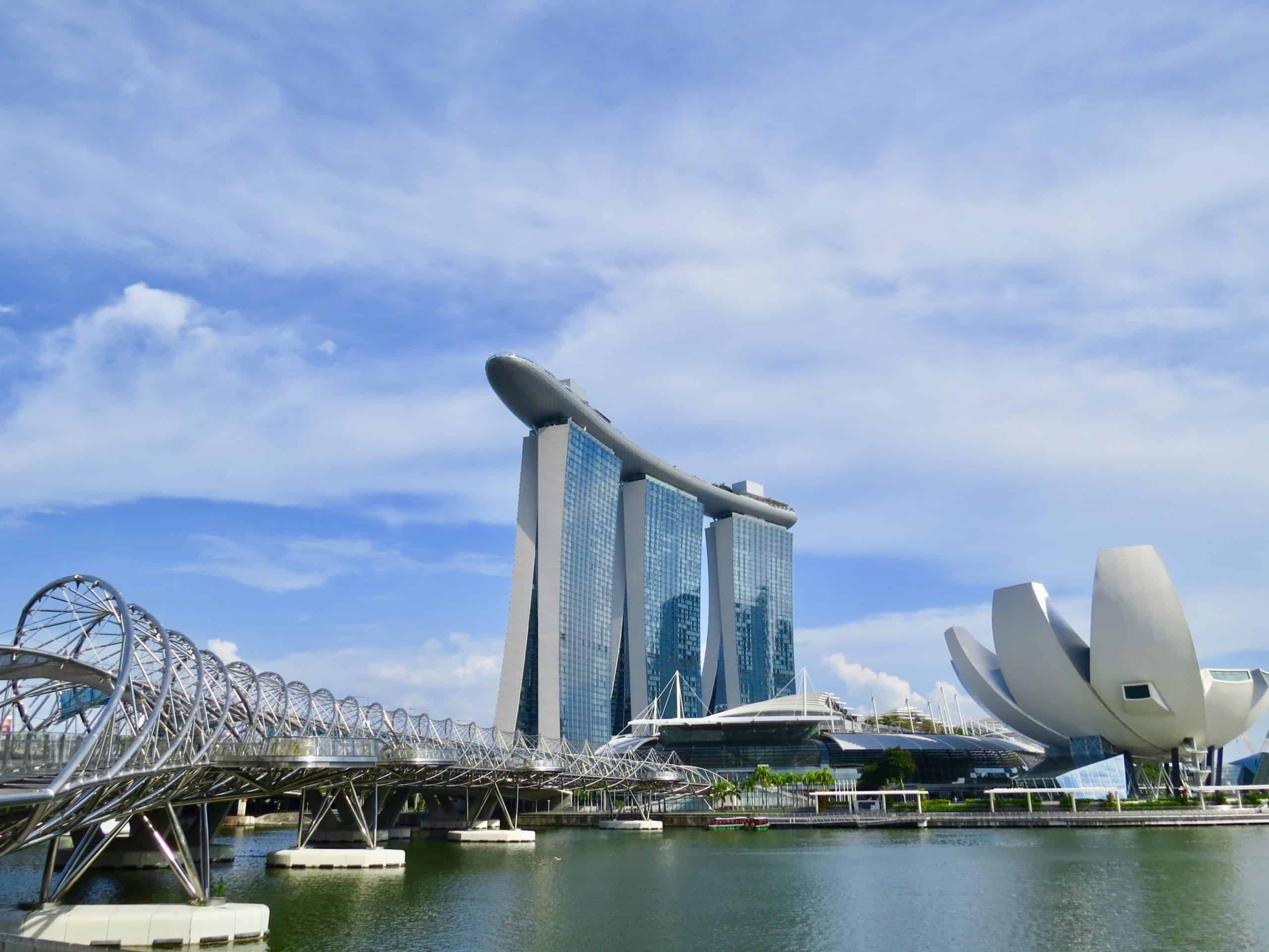Marina Bay Sands hotel with helux bridge to the left and art science museum to the right