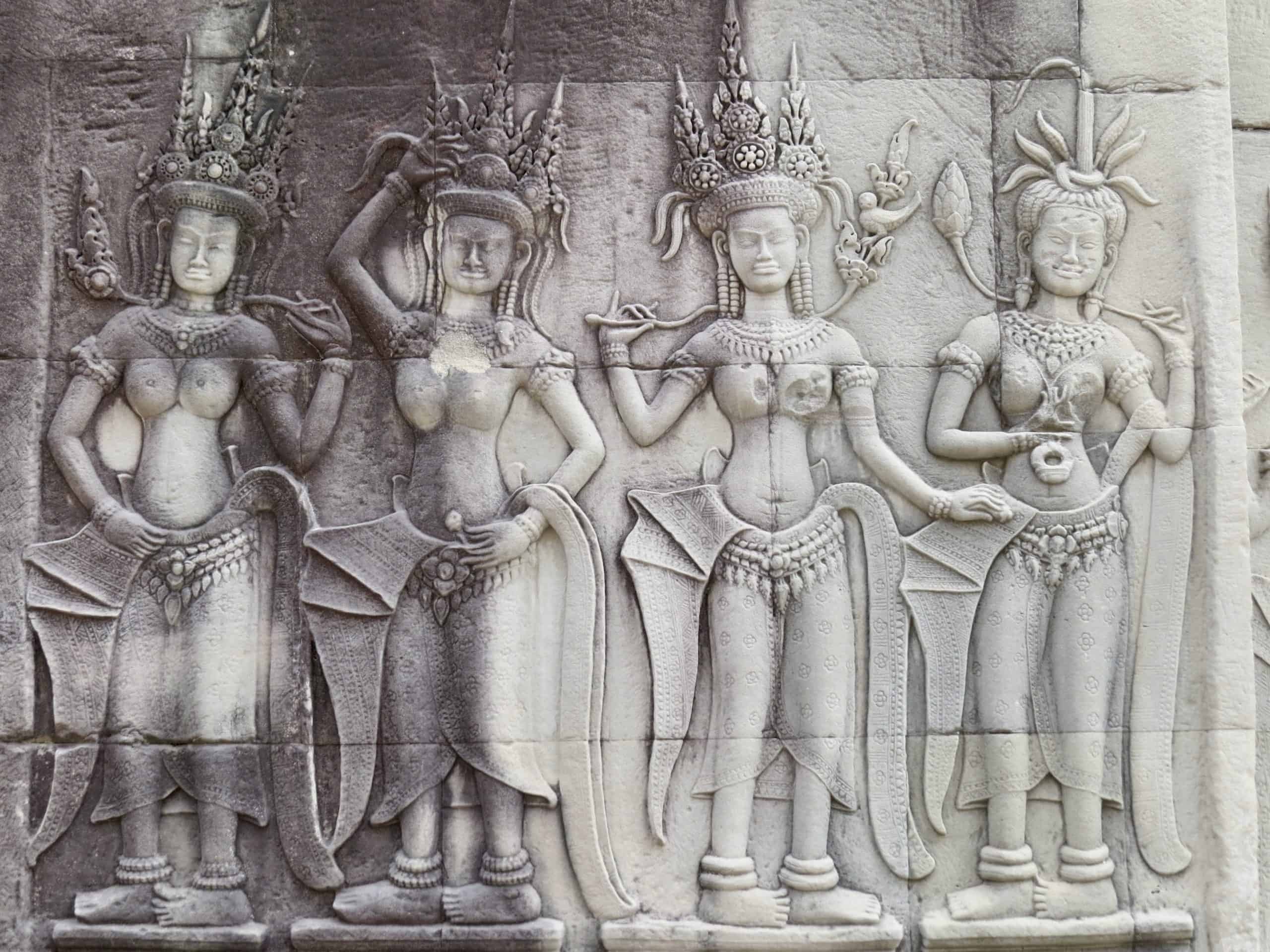 Beautiful detailed carvings of Cambodian dancers at the Angkor Wat Temples