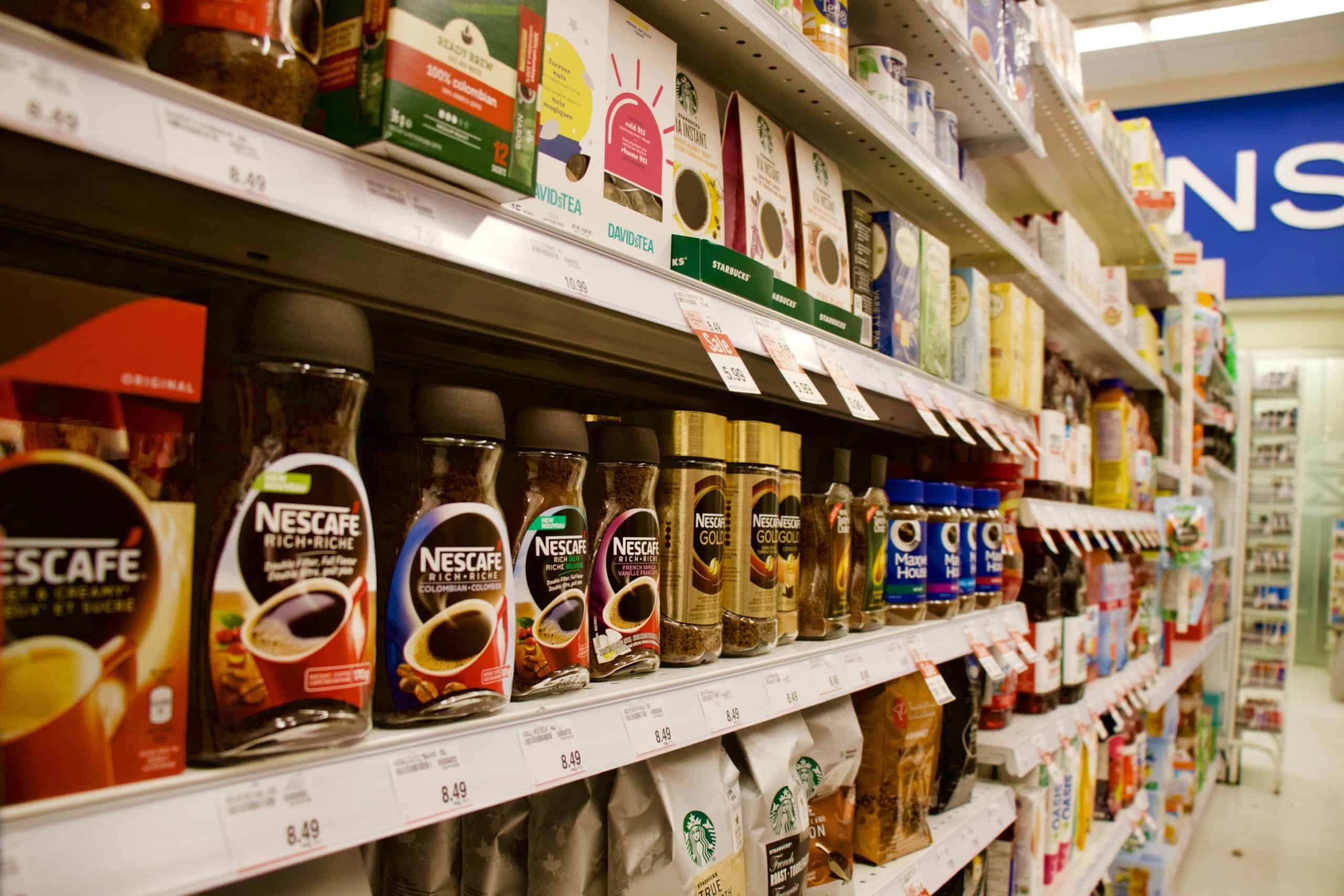 Supermarket aisle with coffee and tea