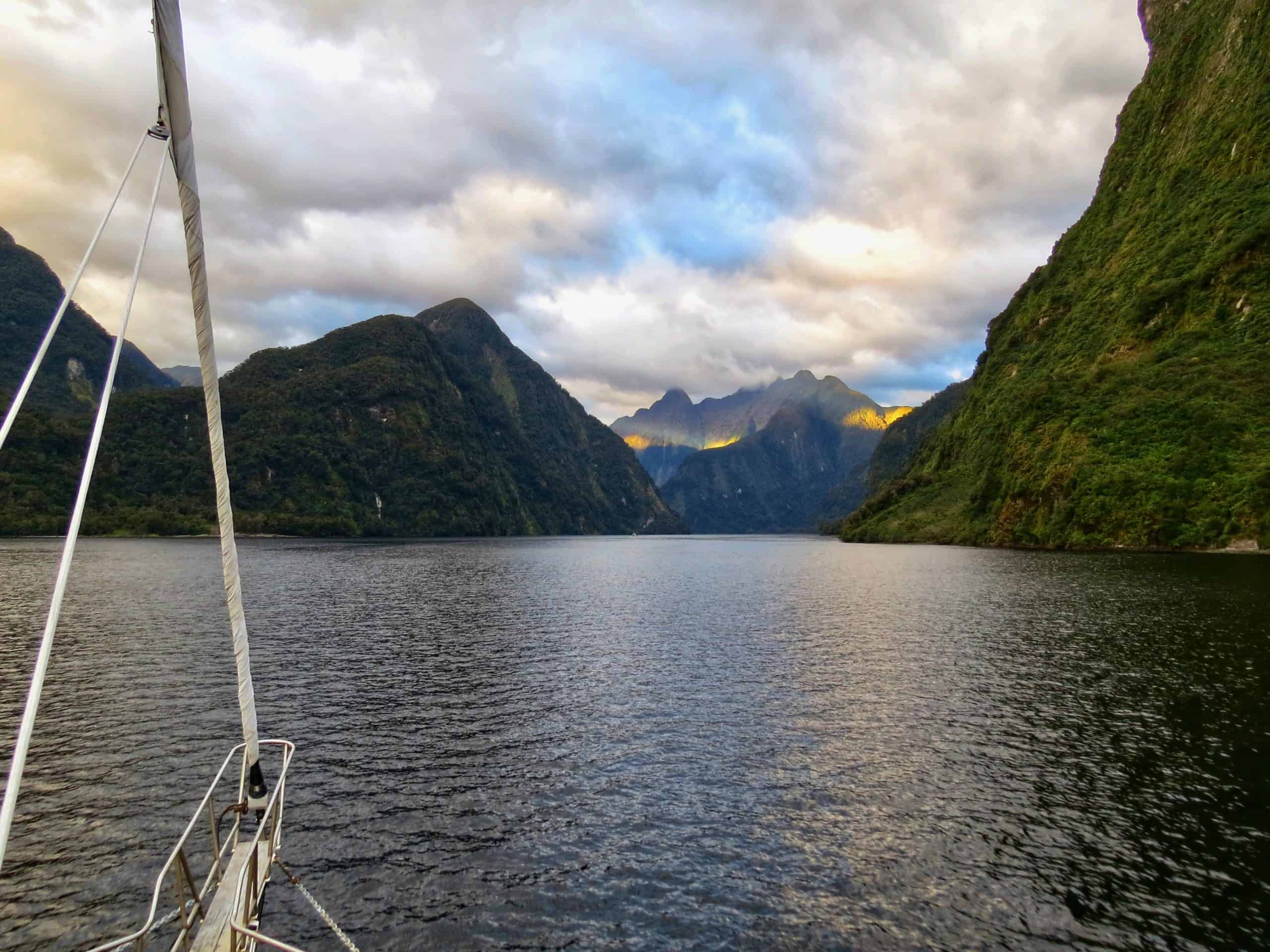 Watching the sun rise over Doubtful Sound on our overnight cruise